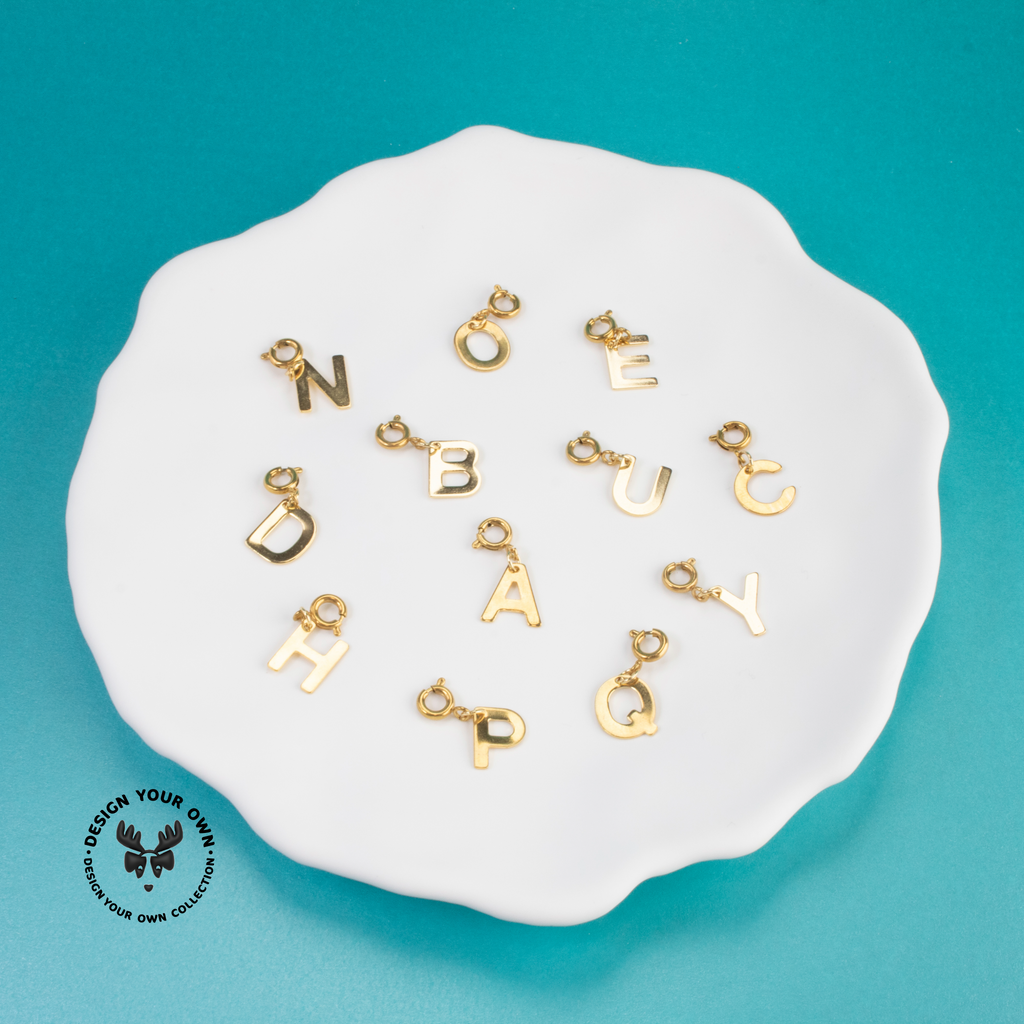 DYO- GOLD STAINLESS STEEL ALPHABET LETTER CHARMS #1